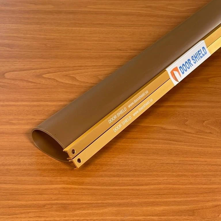 Dark brown shield and brass square binder