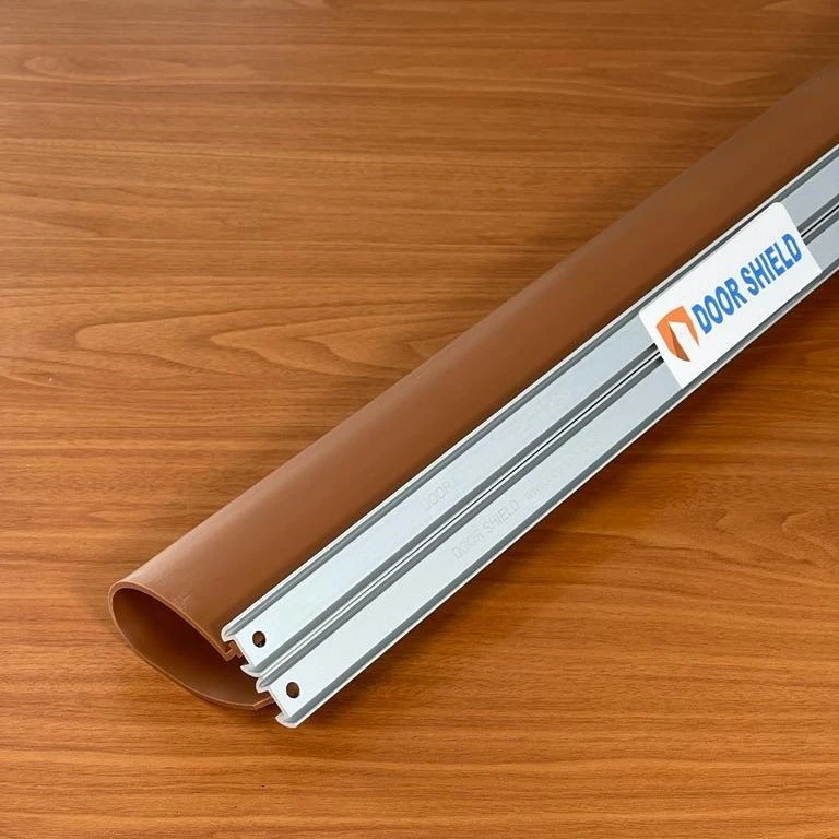 Medium brown shield and solid silver arched binding.