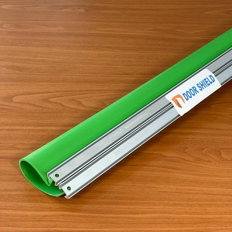 Green shield and silver arched binder